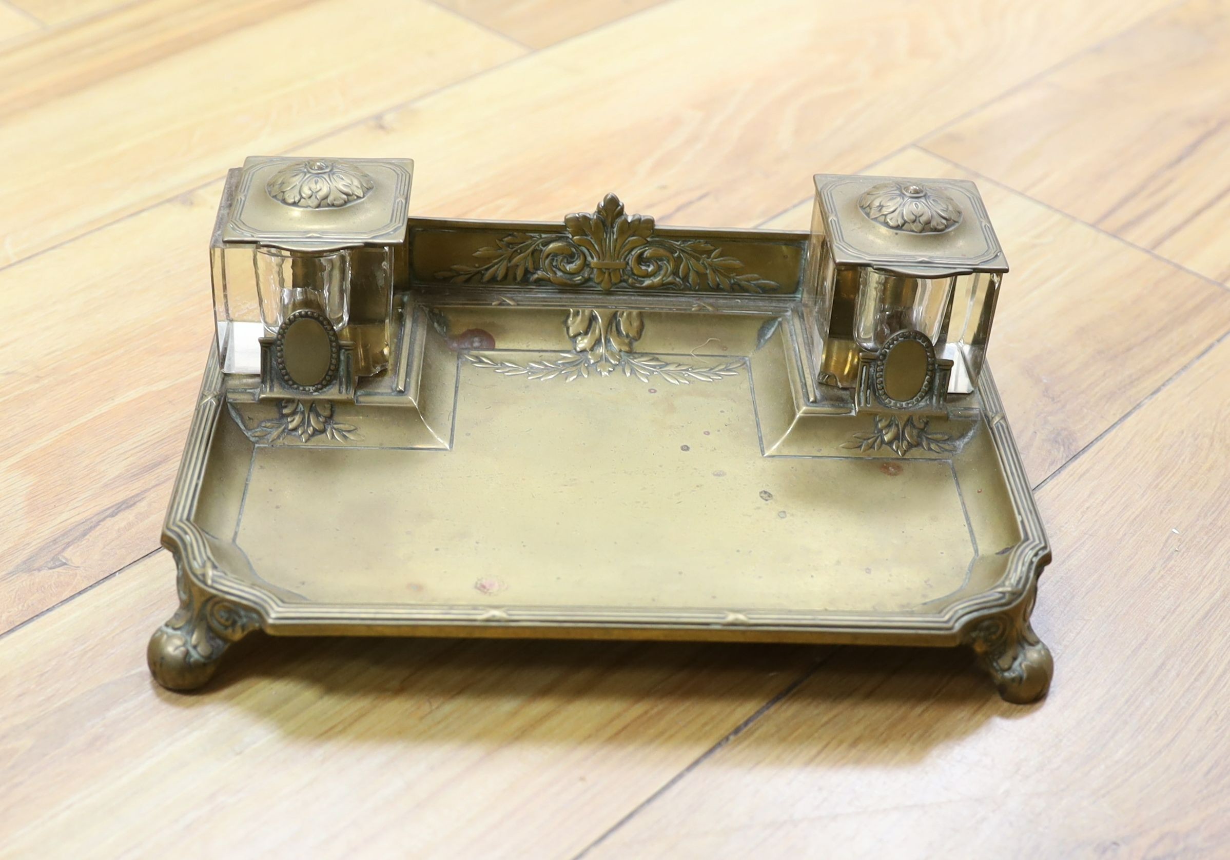 A selection of pewter measures together with an inkstand and miniature wicker furniture (1 box)